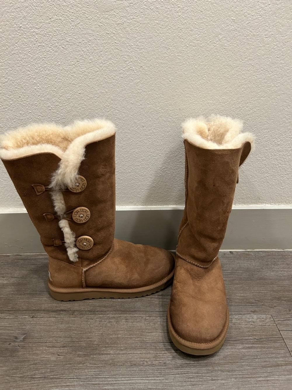 UGG Women's Bailey Button Triplet II Boots in chestnut.